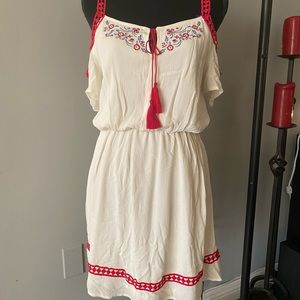 Beautiful dress with lovely accent. Never worn